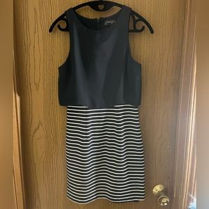 navy blue white striped pincer dress. form fitting. Size 6 It is from Eden Court